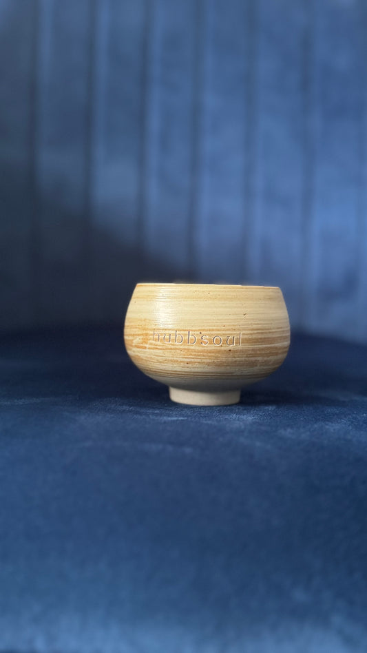 ARTISTIC ESPRESSO CUP WITH A WHITE AND BROWN SWIRL DESIGN